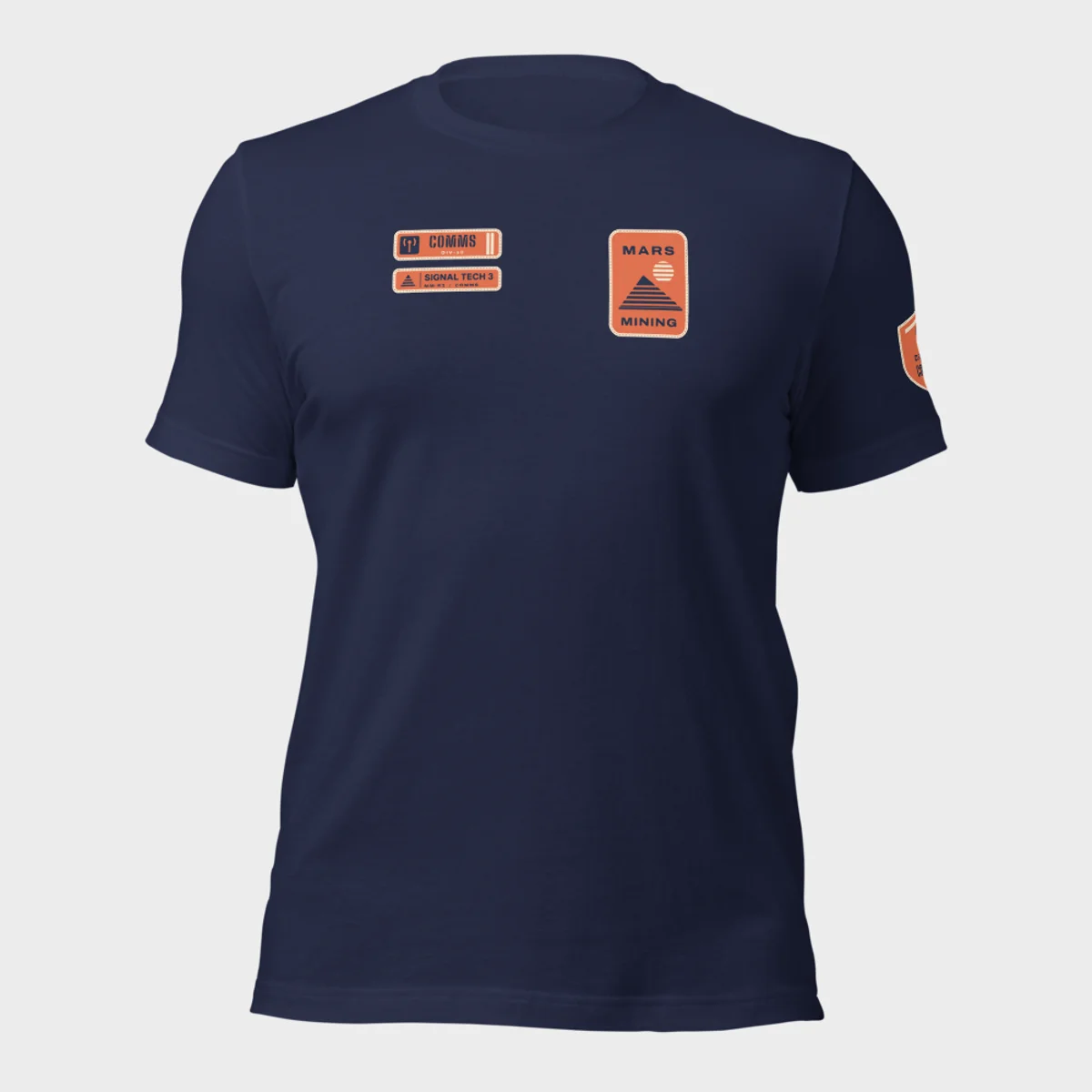 Bella+Canvas 3001 tee in navy with the Mars Mining badge on the left chest and the Comms department tag and rank patch on the right chest