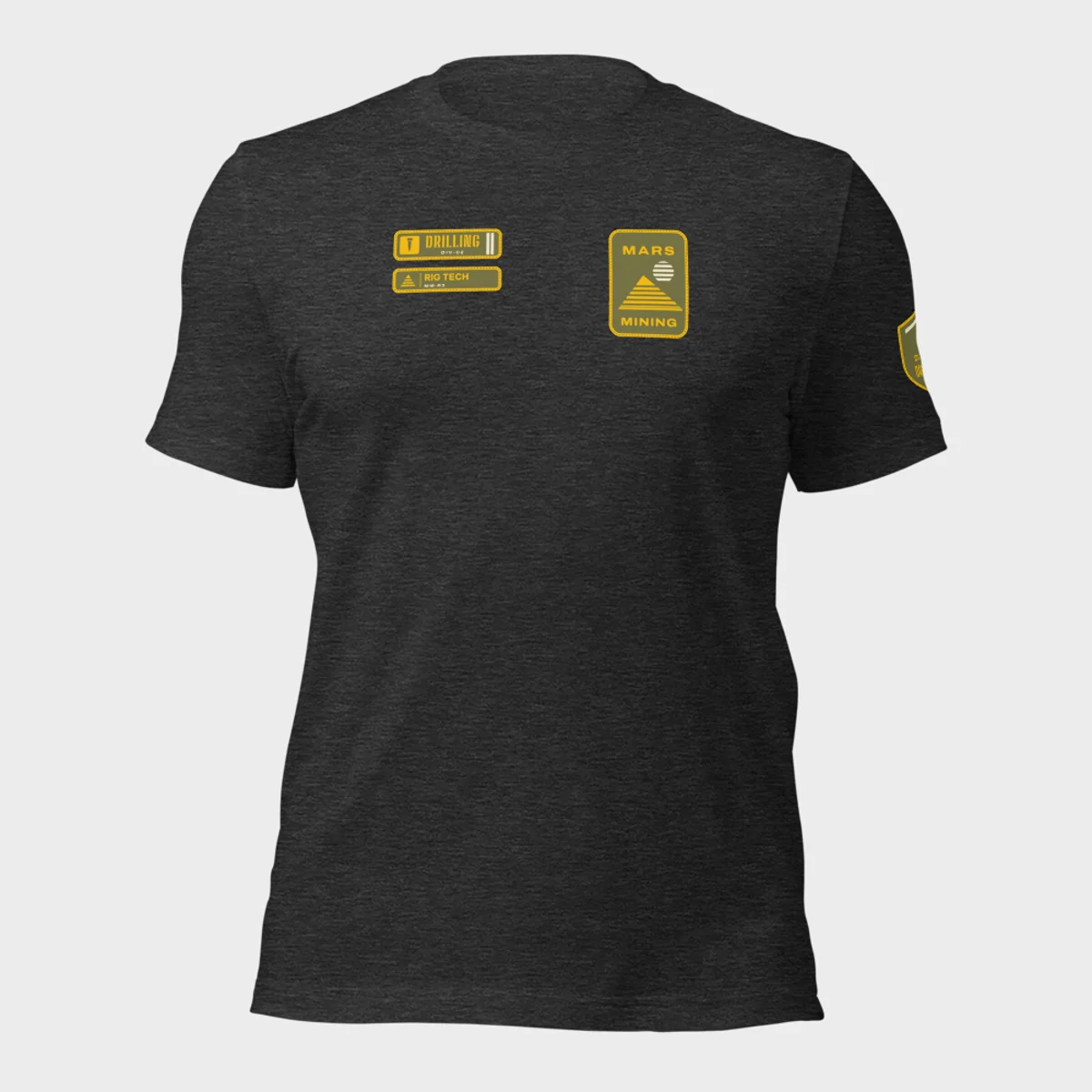 Bella+Canvas 3001 tee in dark grey heather with the Mars Mining badge on the left chest and the Drilling department tag and rank patch on the right chest